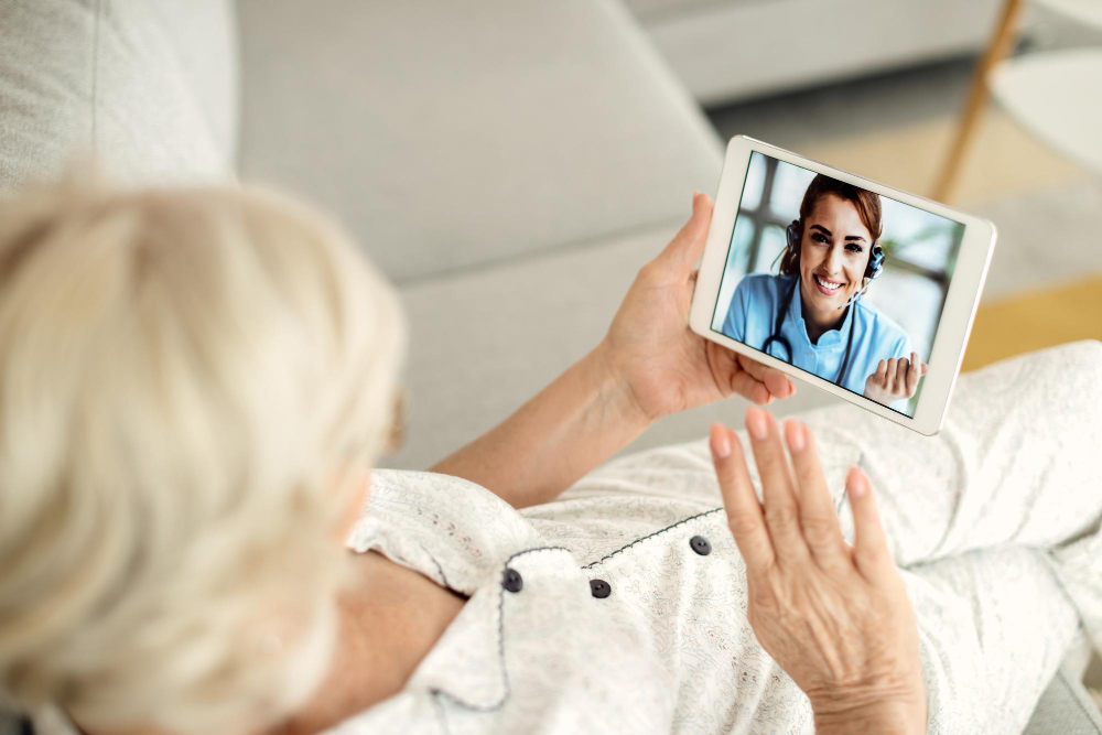 https://credahealth.com/wp-content/uploads/2023/04/closeup-senior-woman-having-video-call-with-her-doctor-touchpad.jpg